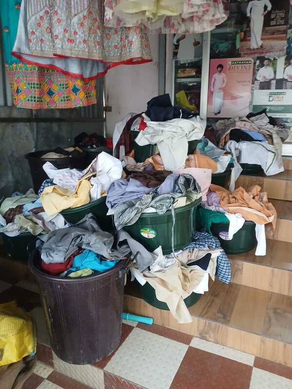 Disposal of Readymade clothes and steel racks on "as where is basis"